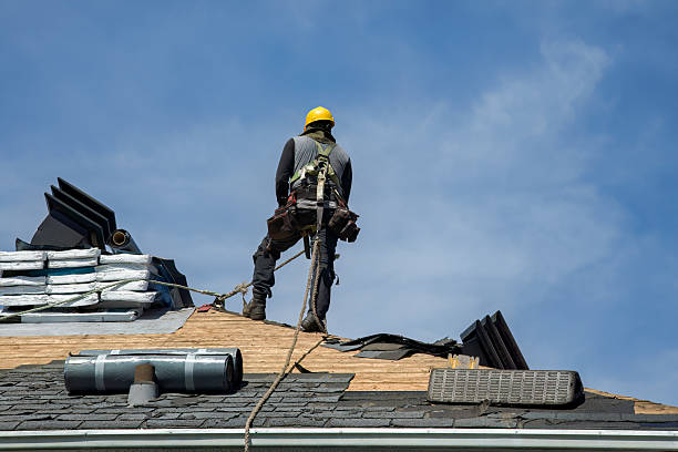 Professional Gutter Installation technician working in Pepperell, MA